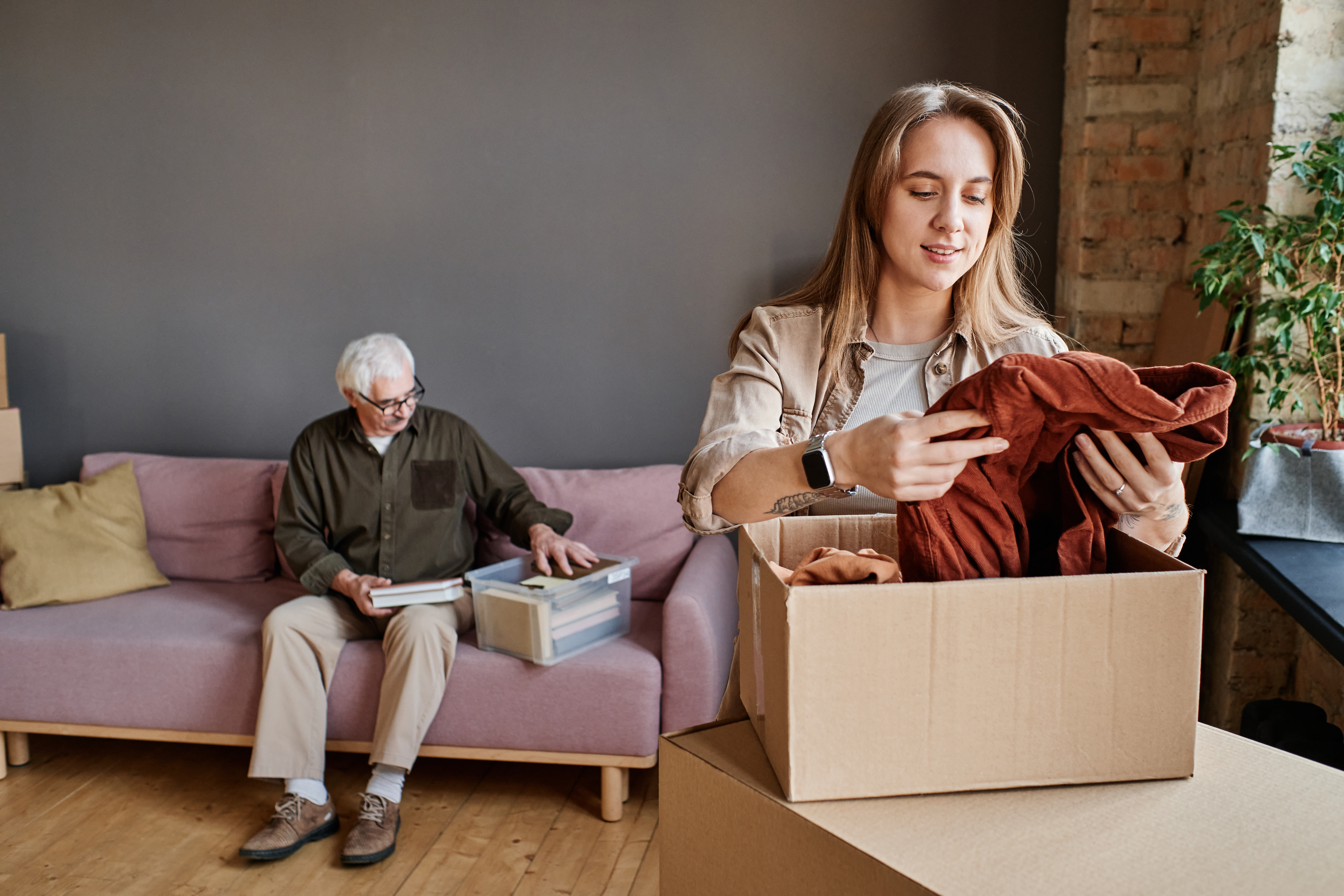 Young Woman Helping Grandpa